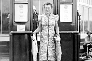 Betsy Johnston, wife of Cash Store owner Harold Johnston, in front of the store with the catch of the day.
